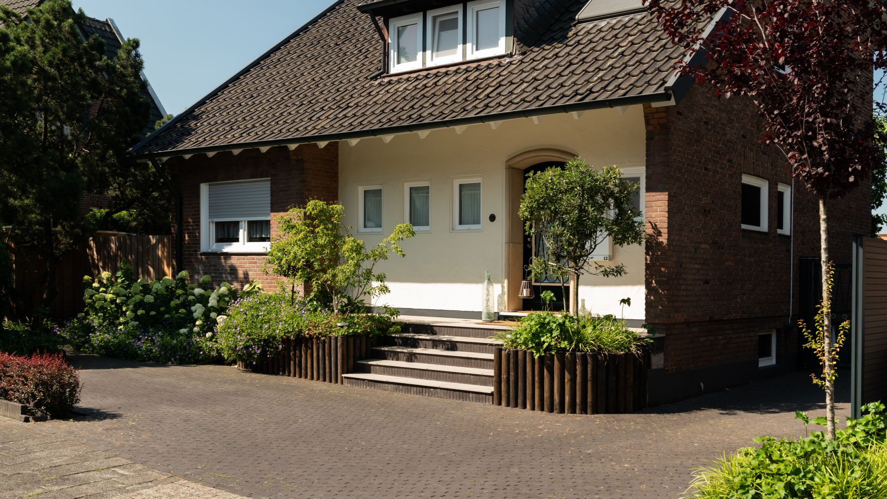 9.4 Garten voller Leben - üppige Bepflanzung trifft auf stilvolle Gestaltung in Bocholt