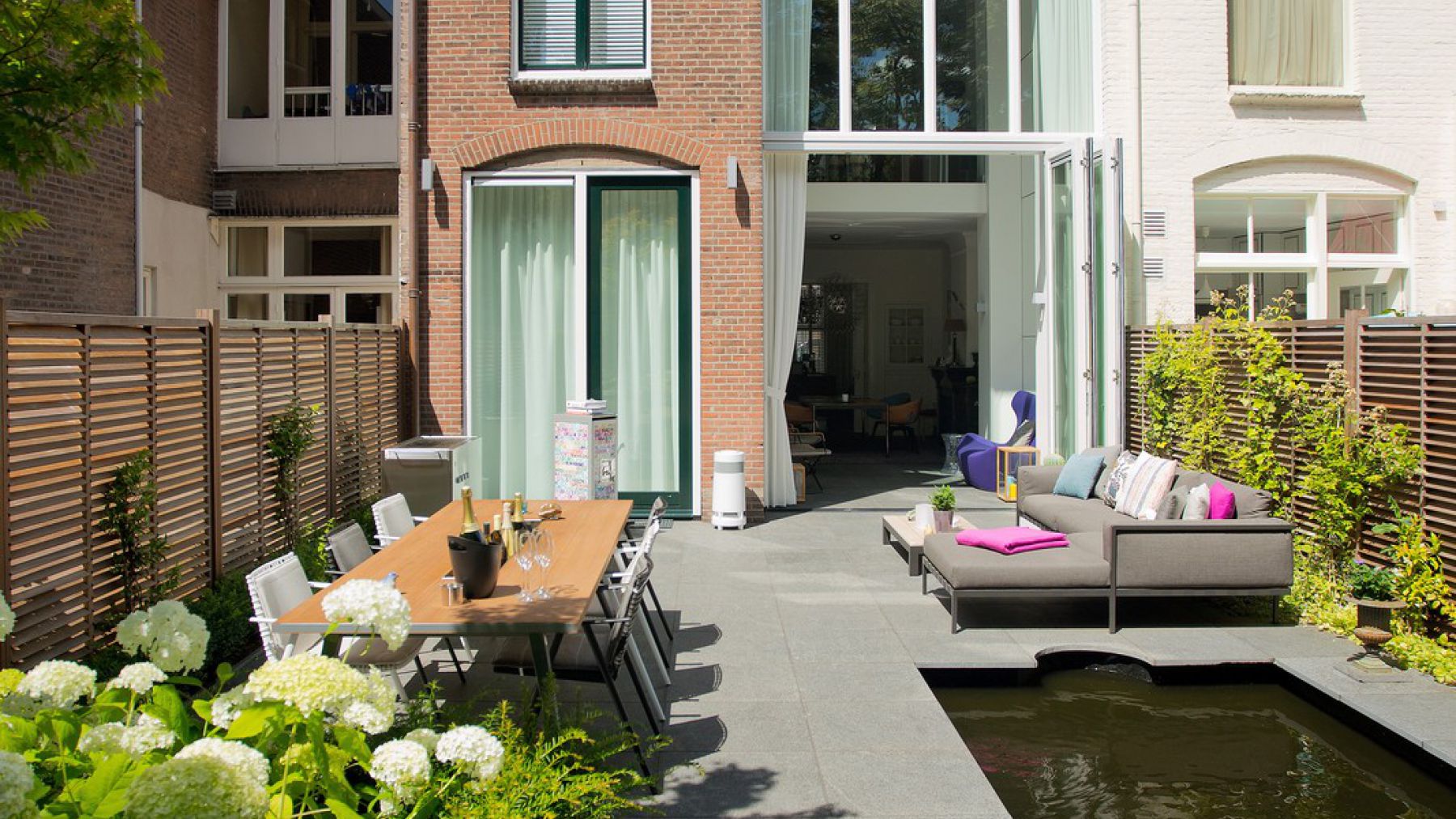 1.17 Klein aber fein - moderner Stadtgarten verbindet draußen und drinnen in Den Haag (NL)